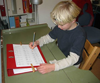 handwriting children on a slanted surface